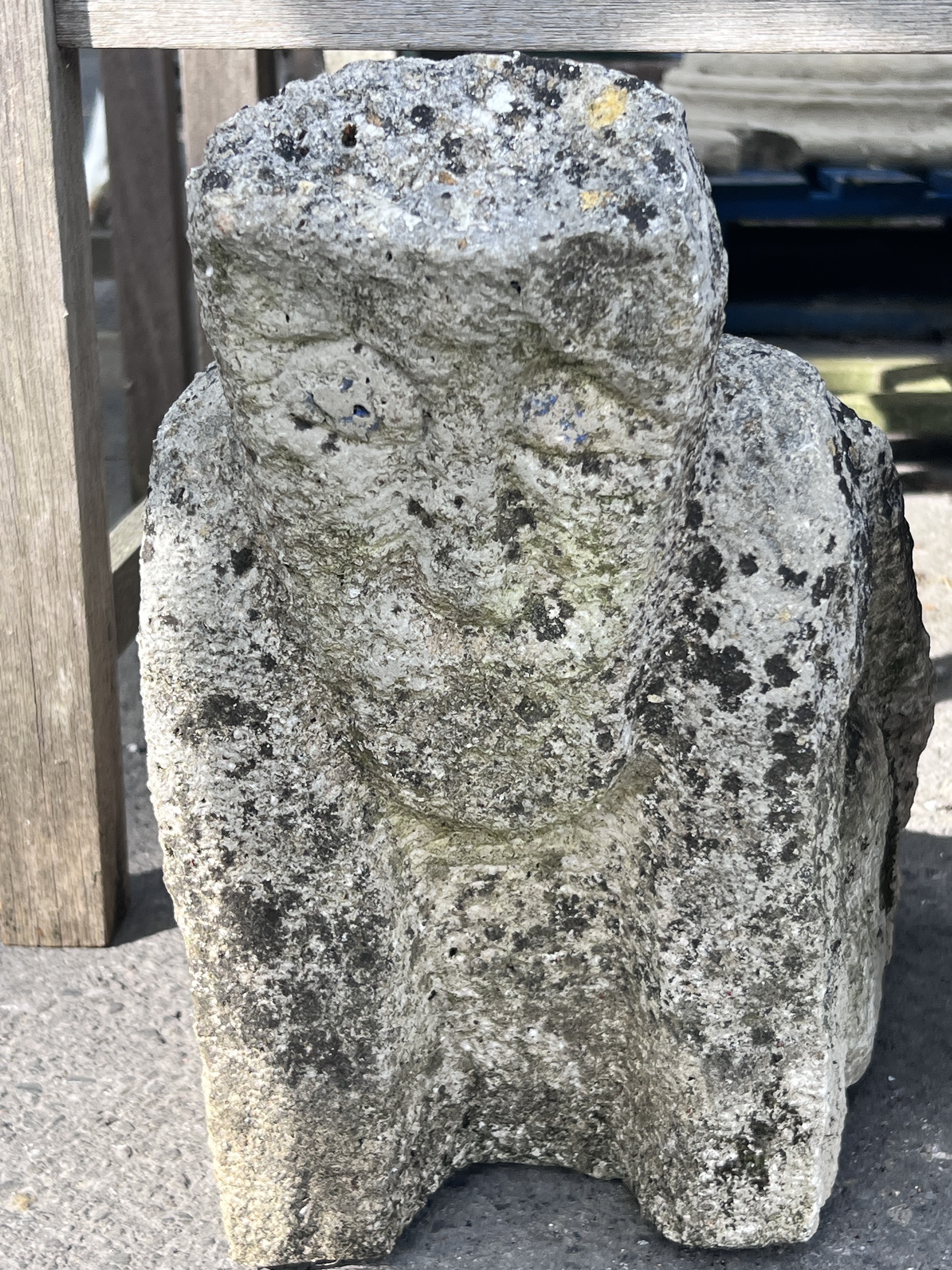 An 'Inca' carved stone head and another of a crouching figure, tallest 43cm